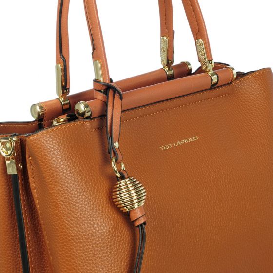 Découvrez le site officiel des sacs à main Ted Lapidus